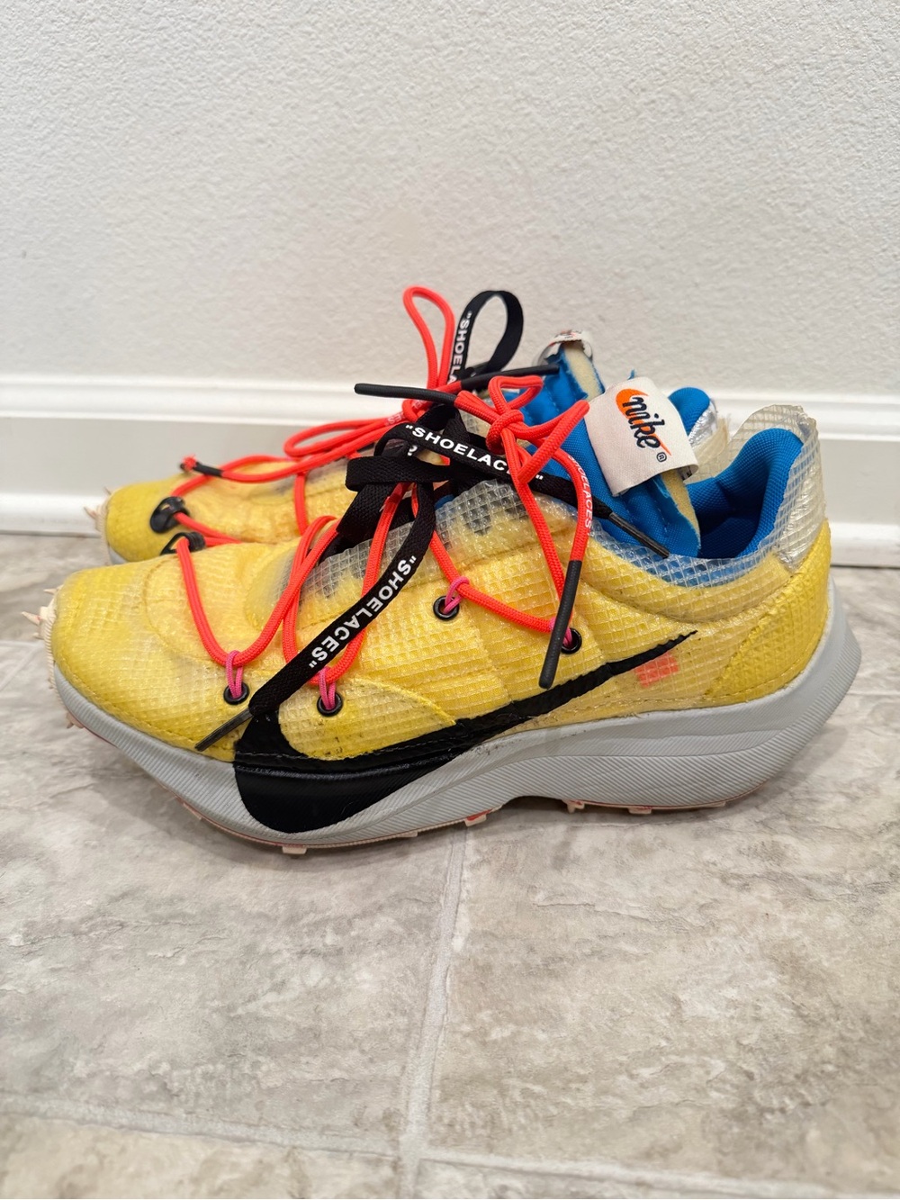 Off-White x Nike Yellow Low-Top Sneakers with Black Swoosh and Orange Laces